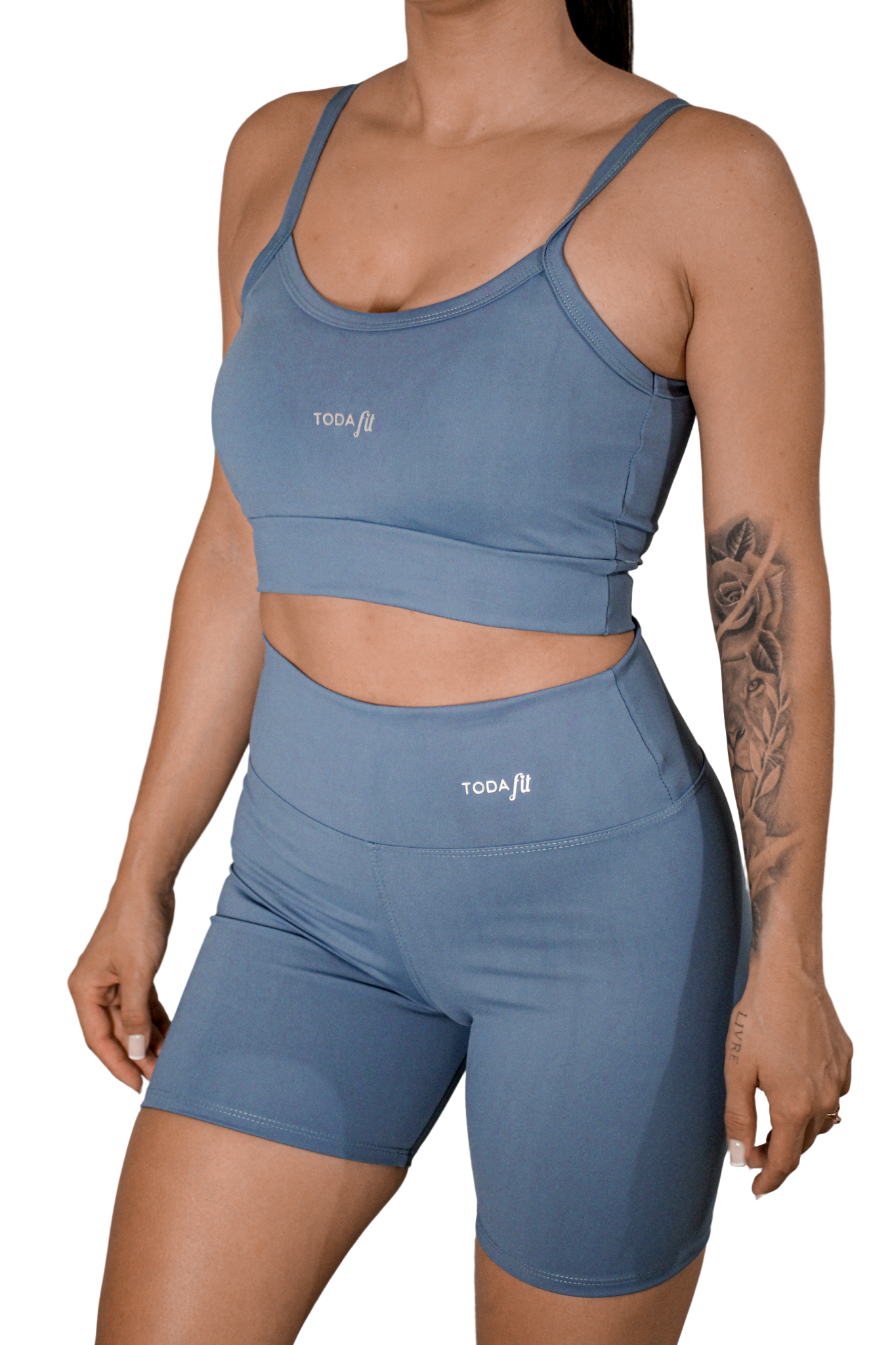 Conjunto top slim e short sem bolso azul TodaFit na vista frontal, com modelagem moderna e tecido confortável para treinos.
