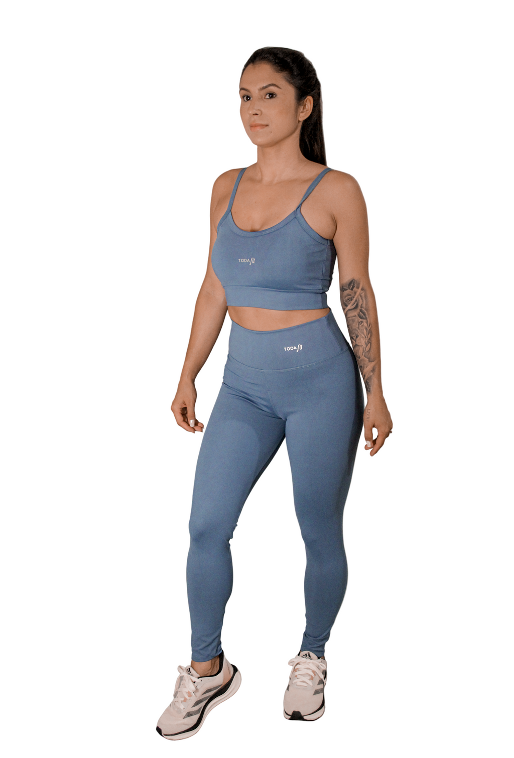 Legging básica azul TodaFit vista de frente, mostrando modelagem e compressão.